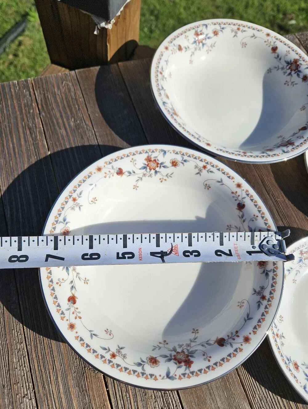 Noritake White Porcelain Dinnerware with Orange Floral Border